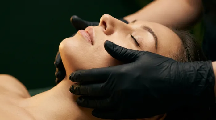 Buccal massage performed by a licensed esthetician at Altru Radiance in Murray, Utah